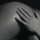 My girlfriend enjoys sleeping with women. Is she bi-sexual or just too scared to admit she's gay?